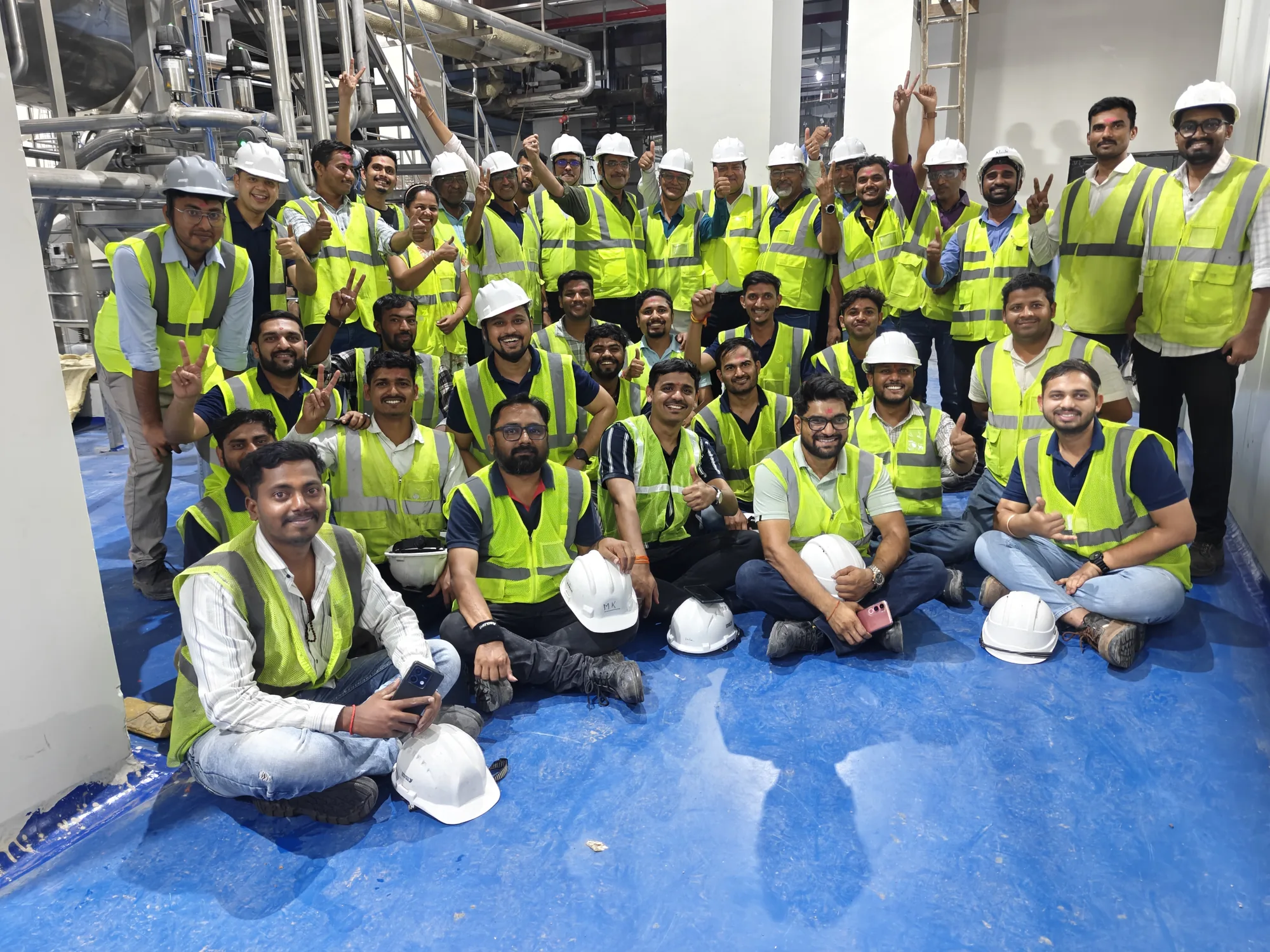 Fytomax team celebrating at the factory